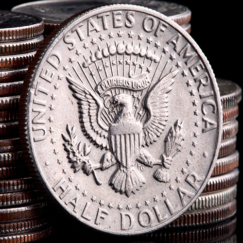 Close-up of 1982 Kennedy half dollar reverse showing Doubled Die Reverse error with doubled lettering on UNITED STATES OF AMERICA