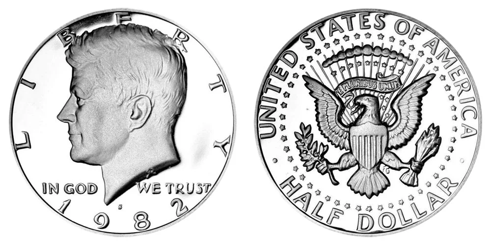 Group of 1982 Kennedy half dollars showing P, D, and S mint mark examples from Philadelphia, Denver, and San Francisco